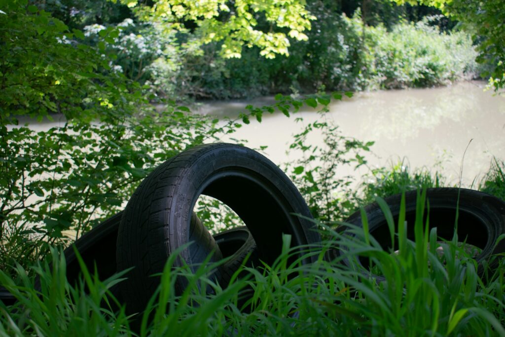car tyres dumped by river